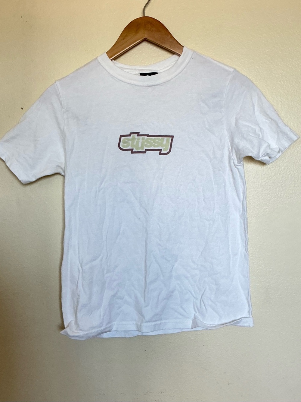 Stussy Graphic White Tee with Olive and Brown Logo